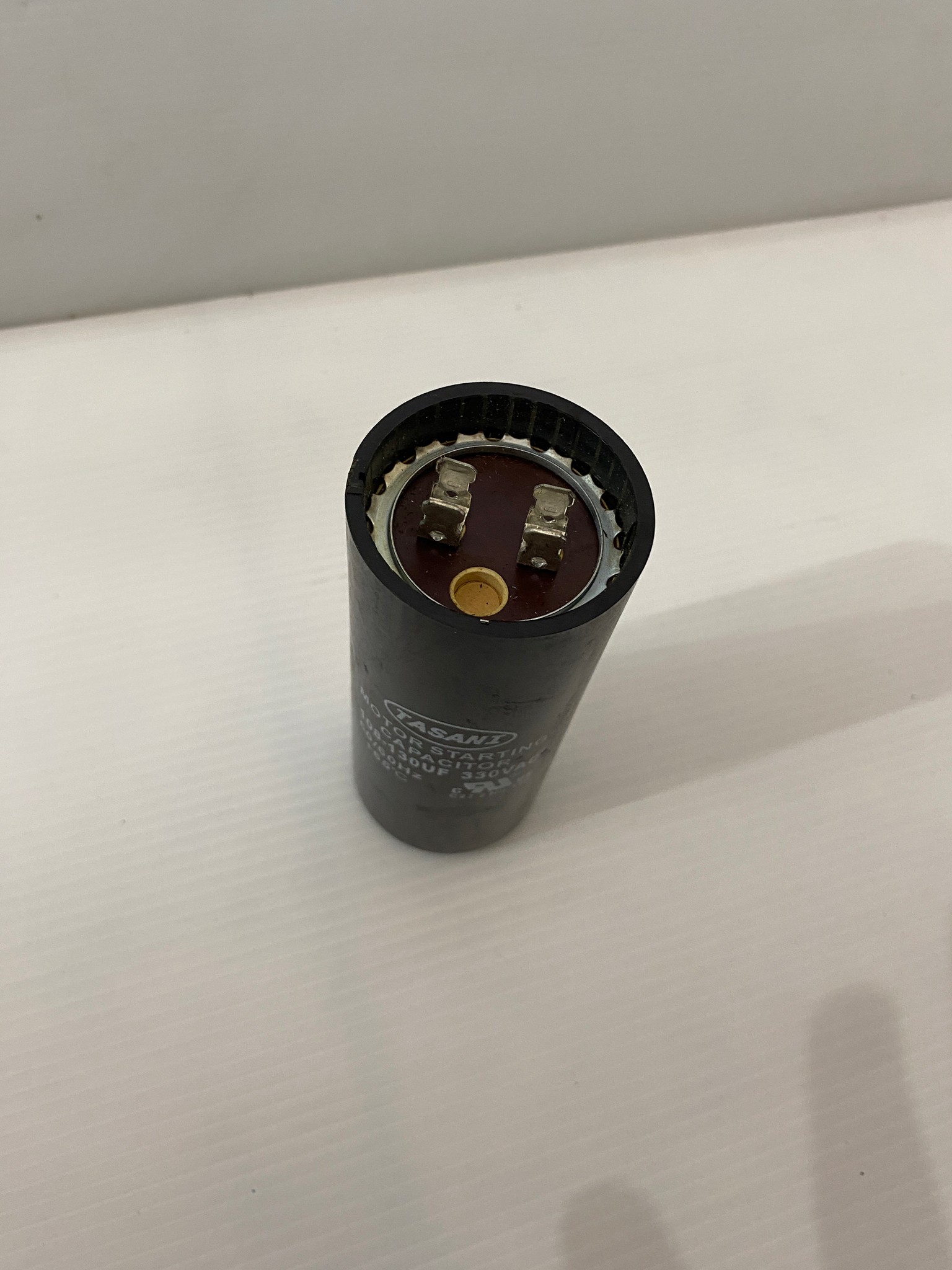 คาปาซิเตอร์ (คอนเดนเซอร์) 108-130uFx330v. TASANI