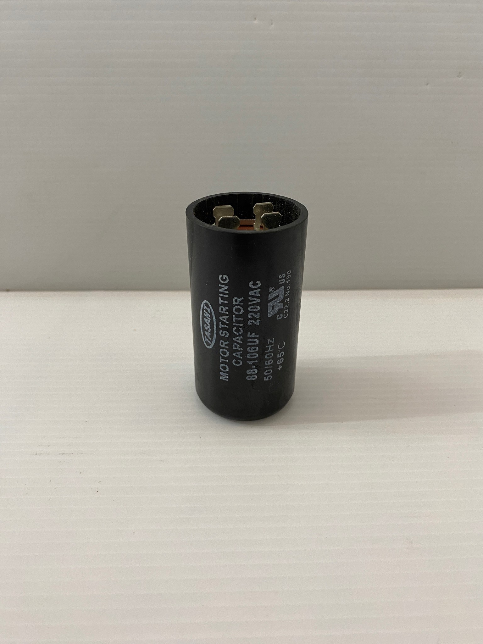 คาปาซิเตอร์ (คอนเดนเซอร์) 88-106uFx220v. TASANI