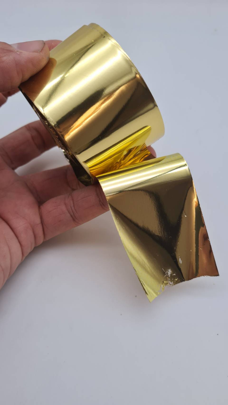 ทองวิทยาศาสตร์แบบม้วนยาว 120เมตร กว้าง 4 เซนติเมตร ใช้งานประดับตกแต่งโดยเฉพาะวัสดุผิวเรียบ gold leaf