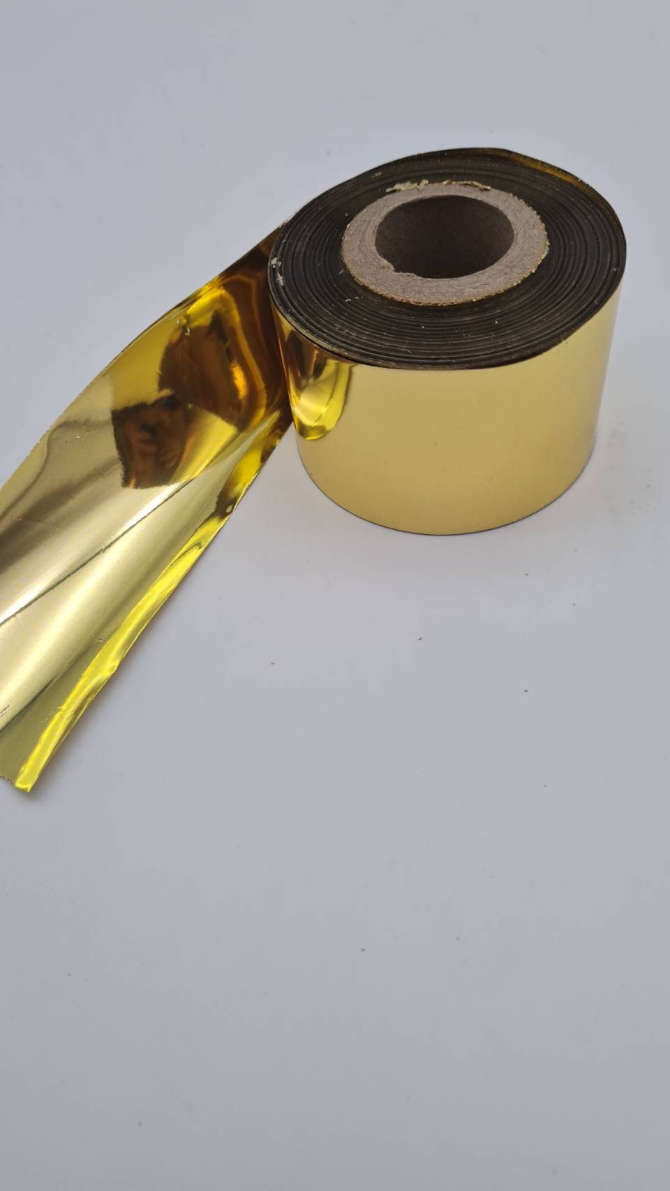 ทองวิทยาศาสตร์แบบม้วนยาว 120เมตร กว้าง 4 เซนติเมตร ใช้งานประดับตกแต่งโดยเฉพาะวัสดุผิวเรียบ gold leaf