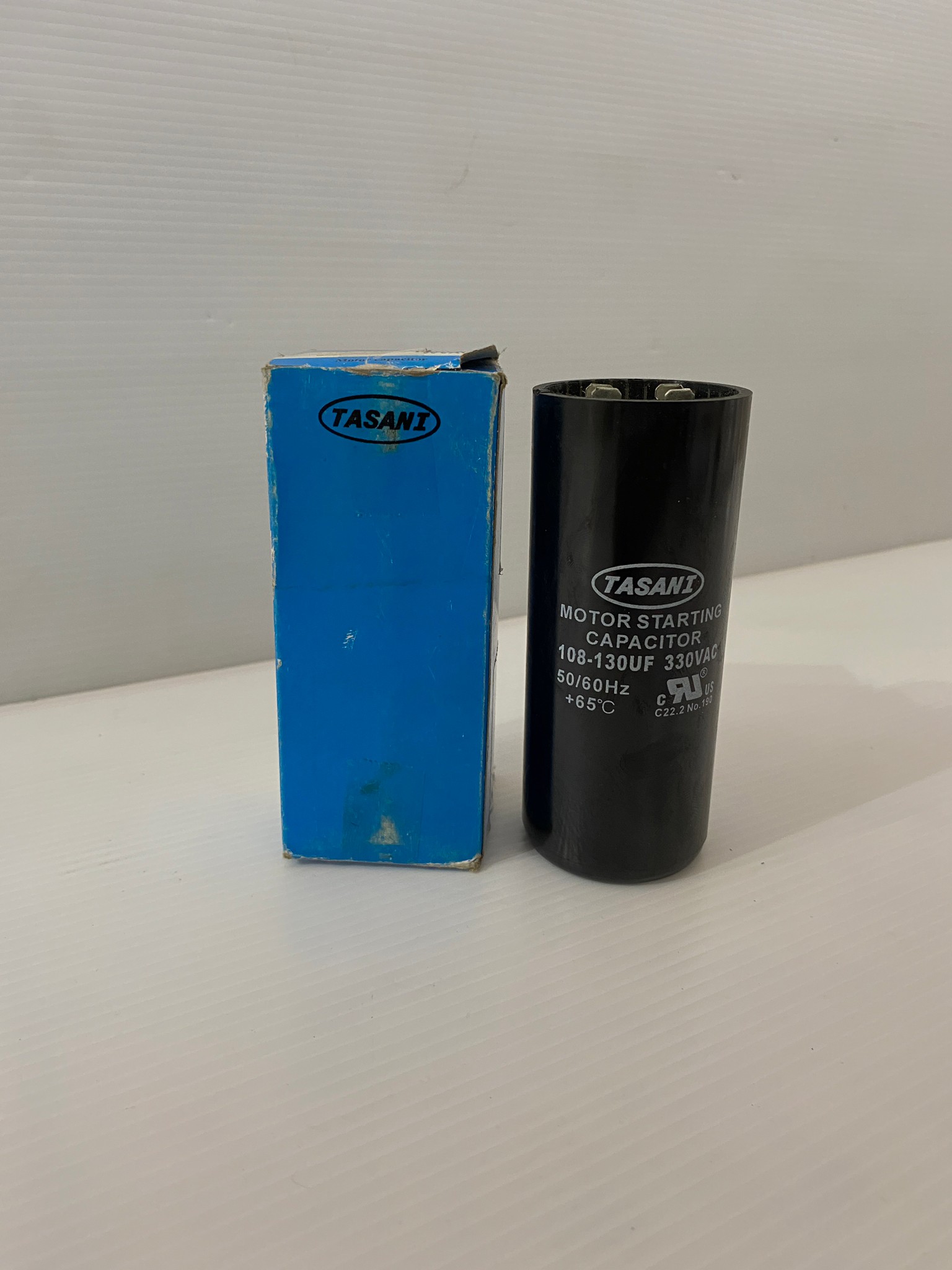 คาปาซิเตอร์ (คอนเดนเซอร์) 108-130uFx330v. TASANI