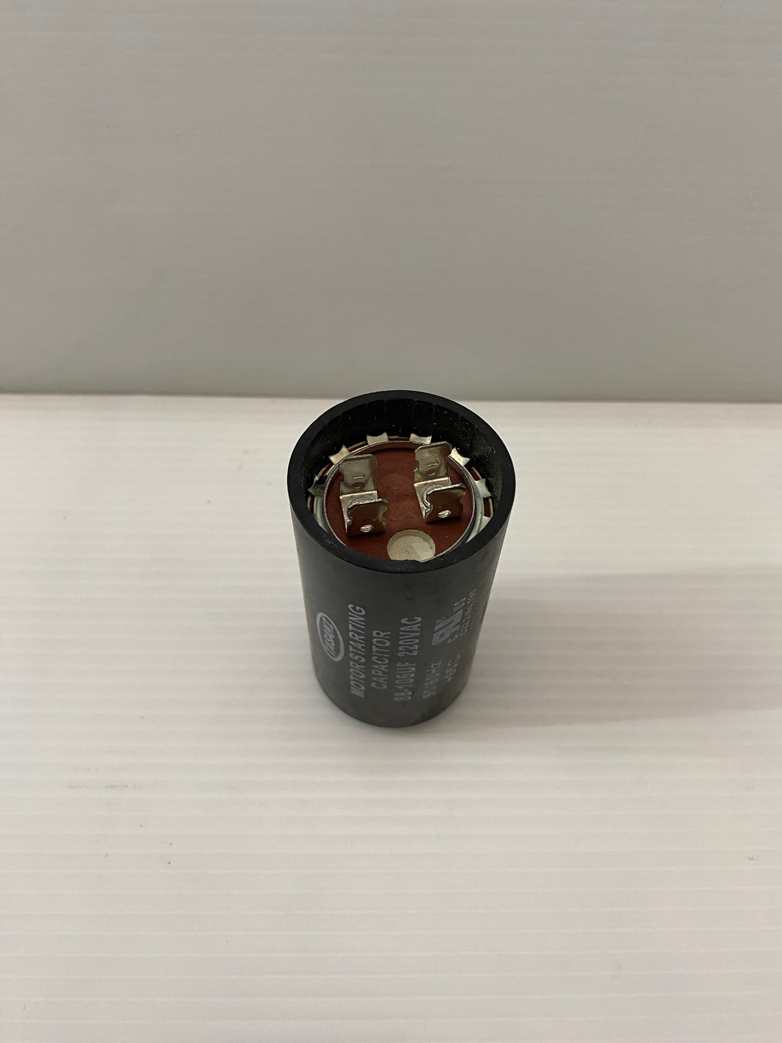 คาปาซิเตอร์ (คอนเดนเซอร์) 88-106uFx220v. TASANI