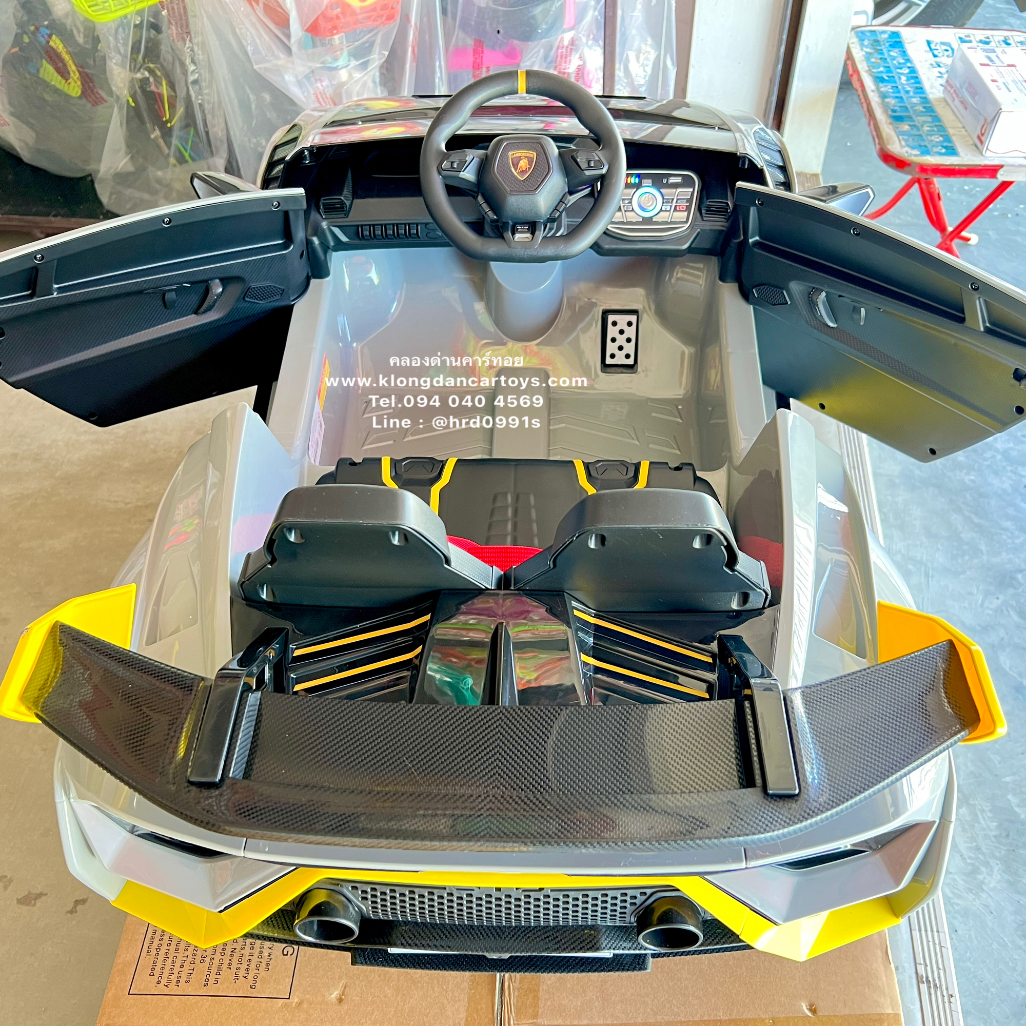 *ลิขสิทธิ์แท้*รถแลมโบกินีHuracanSTO*ดริฟได้, มอเตอร์แรง120W* (2มอเตอร์ แบต12v10a, มีโช้คนิ่ม, มีรีโมทบูลทูธ, เปิดประตูได้)