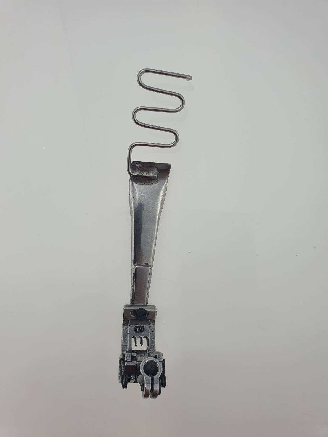 ตีนผีกุ้นจักรลาอุตสาหกรรมแถบผ้า ตีนผีกุ๊นแถบผ้า เช่น กางเกงวอม แถบเส้นบนเสื้อและกางเกงใช้กับจักรลาอุตสาหกรรม