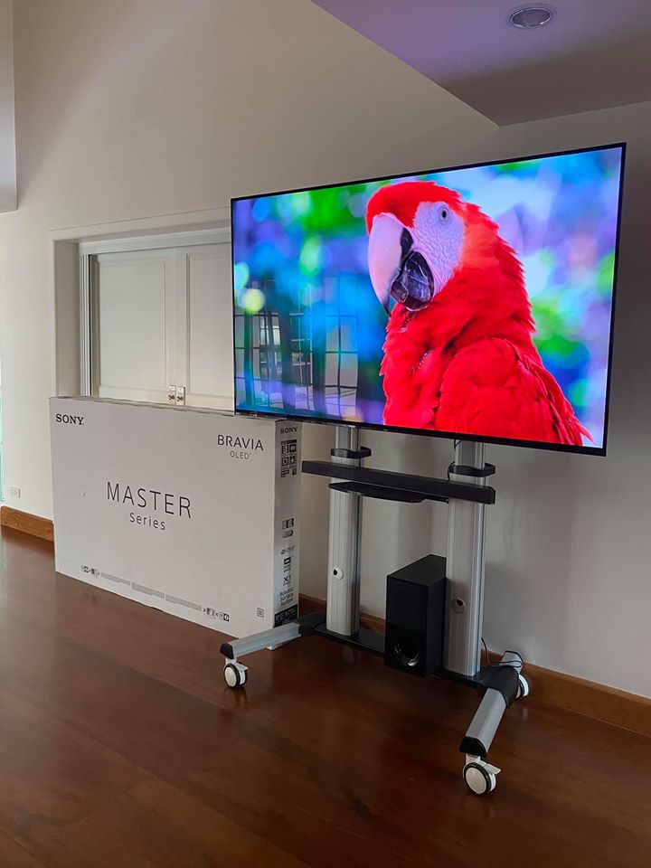 ขาตั้งพื้นทีวีมีล้อเลื่อน 55-98 นิ้ว สีขาว รุ่น MT-F8200