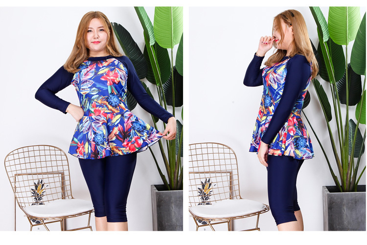 ชุดว่ายน้ำไซส์ใหญ่ ทูพีชพร้อมส่ง :ชุดว่ายน้ำคนอ้วนแขนยาวแบบสปอร์ตสีน้ำเงินแต่งลายดอกไม้และระบายชายเสื้อ set 2 ชิ้นมีเสื้อและกางเกงแบบสวยน่ารักมากๆจ้า:รอบอก44-54นิ้ว เอว34-46นิ้ว สะโพก44-56นิ้ว