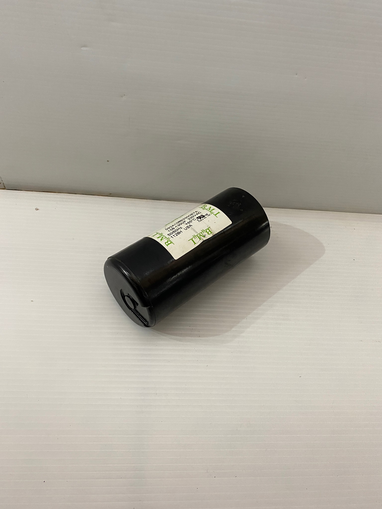 คาปาซิเตอร์ (คอนเดนเซอร์) 108-130uFx330v. B.M.I.แท้