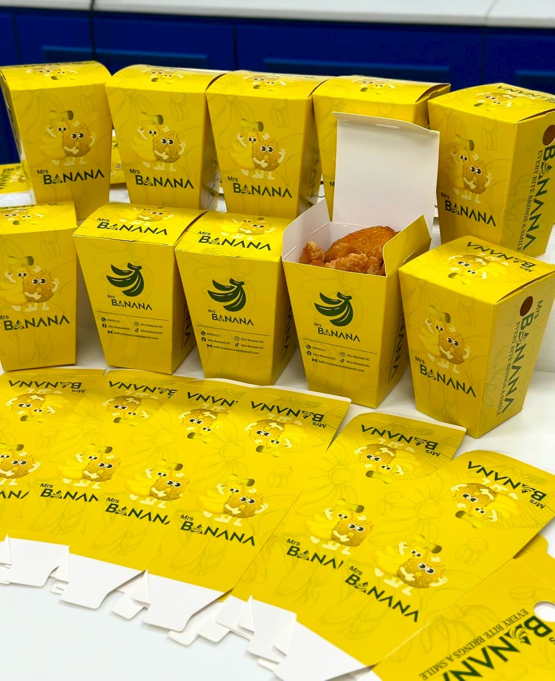 ผลงาน "กล่องไก่ป๊อปพิมพ์โลโก้"