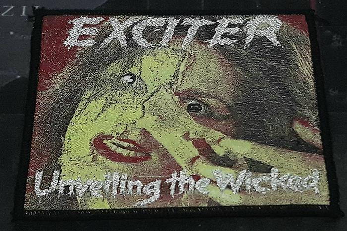 EXCITER'Unveiling The Wicked' Woven Patch (อาร์มแบบทอ)