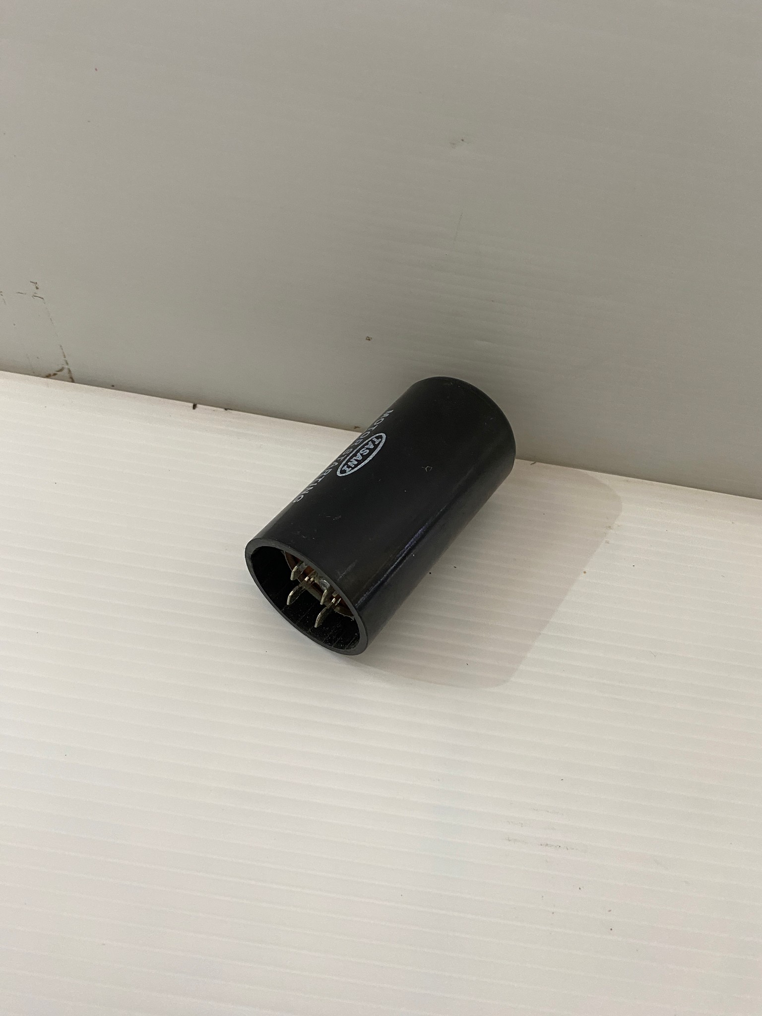 คาปาซิเตอร์ (คอนเดนเซอร์) 88-106uFx220v. TASANI