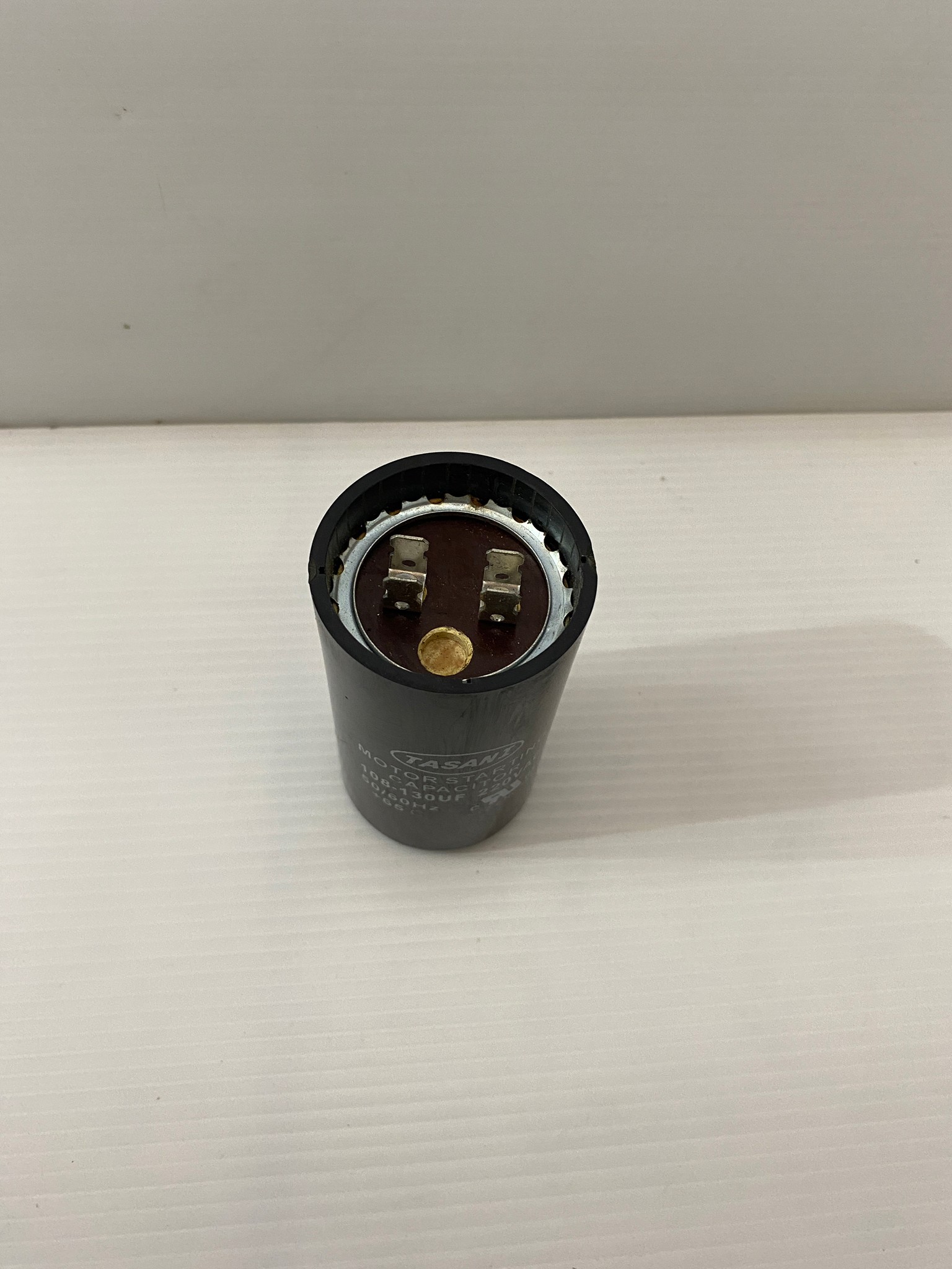 คาปาซิเตอร์ (คอนเดนเซอร์) 108-130uFx220v. TASANI