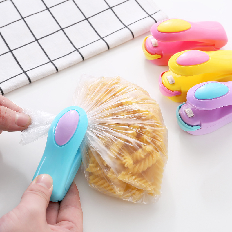 ที่ซีลปากถุงพกพา เครื่องซีลพลาสติกขนาดเล็ก แบบมือกดความร้อน ที่รีดปากถุง