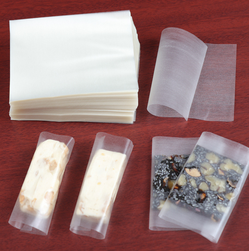 กระดาษข้าวเหนียว กระดาษห่อลูกอม กระดาษห่อนูกัส ขนาด 9x12.5 ซม. จำนวน 95-100 แผ่นต่อแพ็ค ชุดที่ 2/2