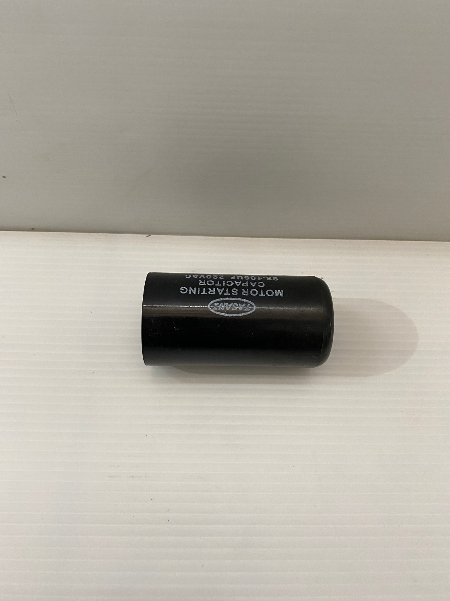 คาปาซิเตอร์ (คอนเดนเซอร์) 88-106uFx220v. TASANI