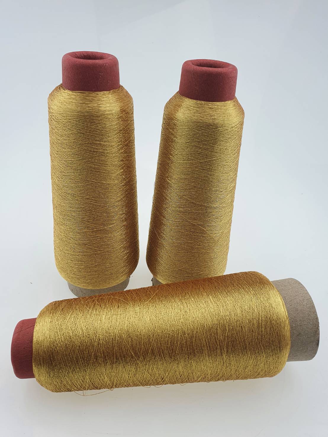 ดิ้นกลมสำหรับจักรปักคอมพิวเตอร์ สีทองขนาด 125 กรัม ความ ยาว 3000เมตร เส้นเหนียวไม่ขาดง่ายปักงานต่อเนื่องได้ยาว