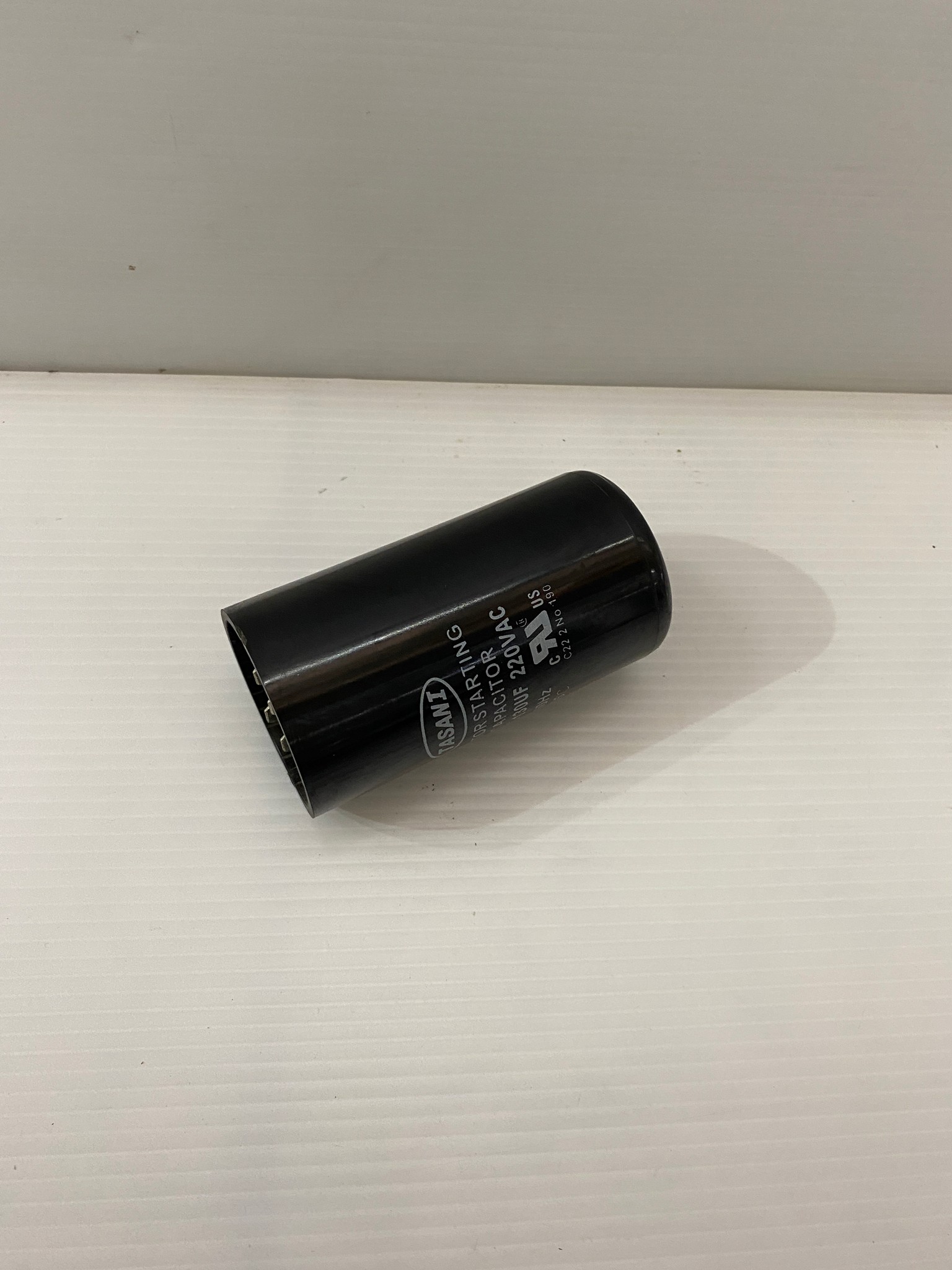 คาปาซิเตอร์ (คอนเดนเซอร์) 108-130uFx220v. TASANI