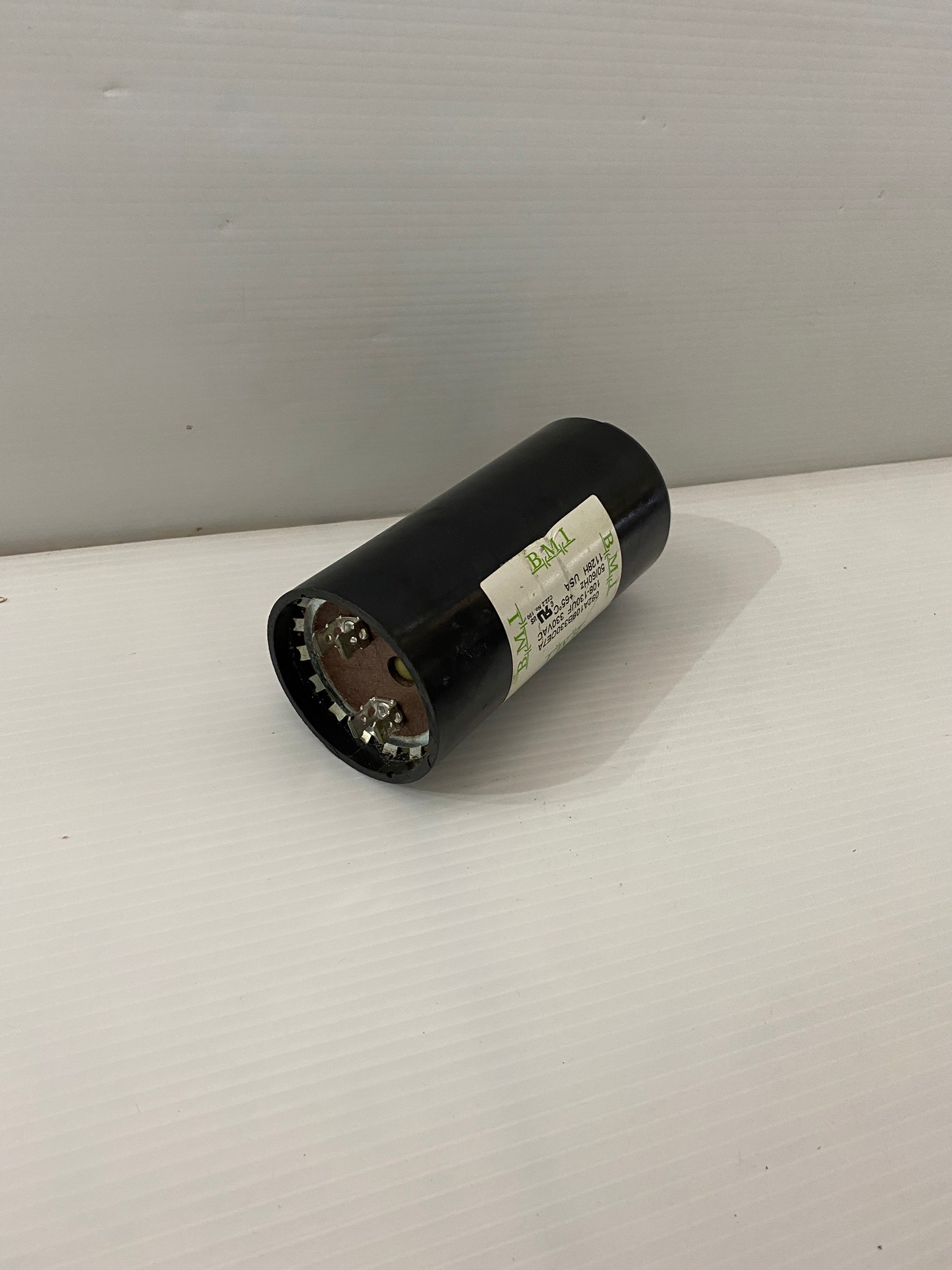 คาปาซิเตอร์ (คอนเดนเซอร์) 108-130uFx330v. B.M.I.แท้