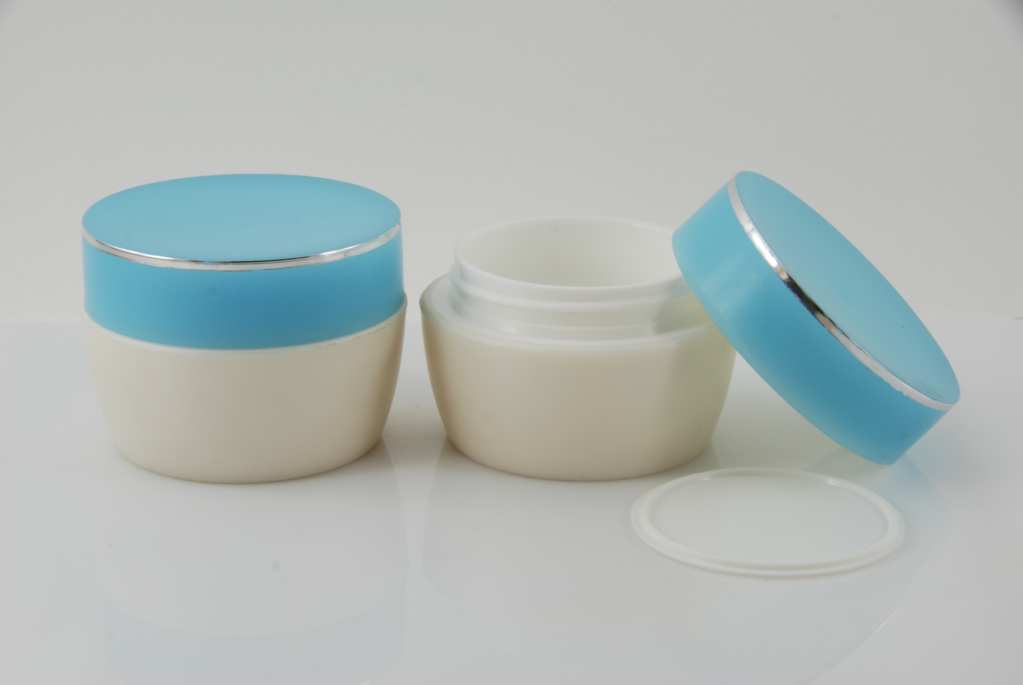 กระปุกครีม (R278) 50 กรัม สี ฟ้า-ขาว แพคละ 4 ใบ