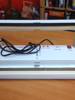 เครื่องซีลสูญญากาศแบบฝาเปิด