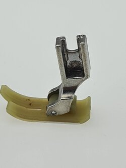 ตีนผีพลาสติก ตีนผีเทปล่อน (MT-18) สำหรับจักรเย็บอุตสาหกรรม