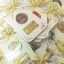 ของชำร่วยงานศพ กระดาษแข็งใส่เหรียญ พร้อม เหรียญ 10.- ร.10 ติดสติ๊กเกอร์ใส่ถุงพลาสติกแก้ว ชิ้นละ 24.- / ถุงผ้า 29.- / ถุงผ้าโบว์ 30.-
