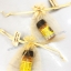 ของชำร่วยงานศพ น้ำมันเขียวเสลดพังพอน /น้ำมันเหลืองไพร ตราแม่กุหลาบ 5cc (ST) ใส่ถุงพลาสติกแก้ว 25.-/ถุงผ้า 28.-/ ถุงผ้าติดโบว์ 29.-